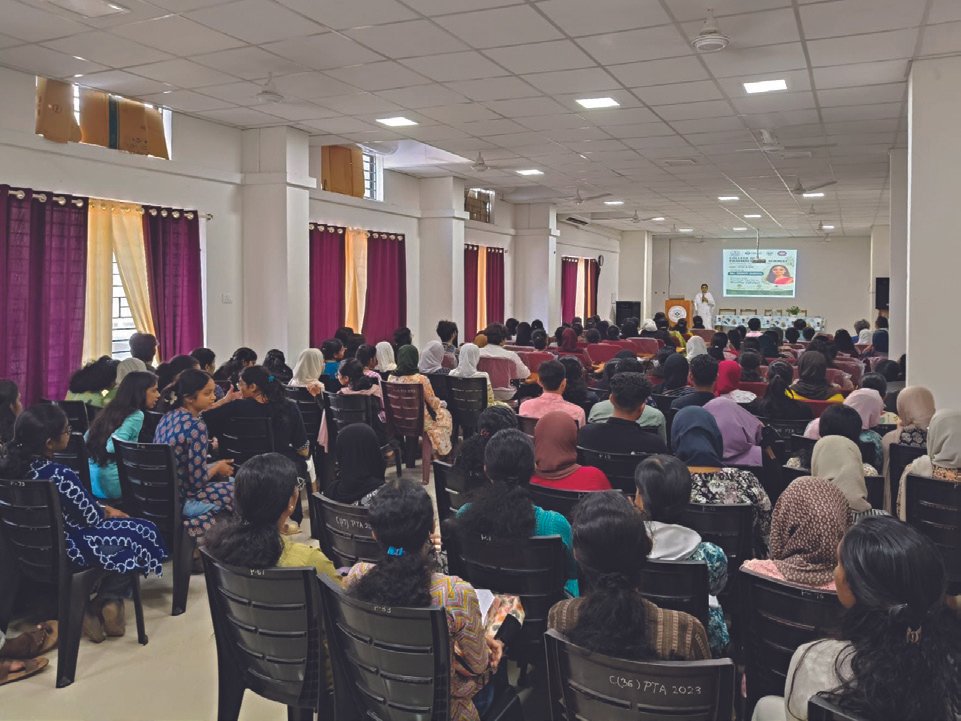 A packed hall listening to a talk at Pharmacy College, Govt Medical Institute, Kottayam
