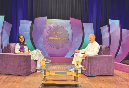 Smriti Budhia in conversation on a television studio set in Godlywood Studio, Mount Abu
