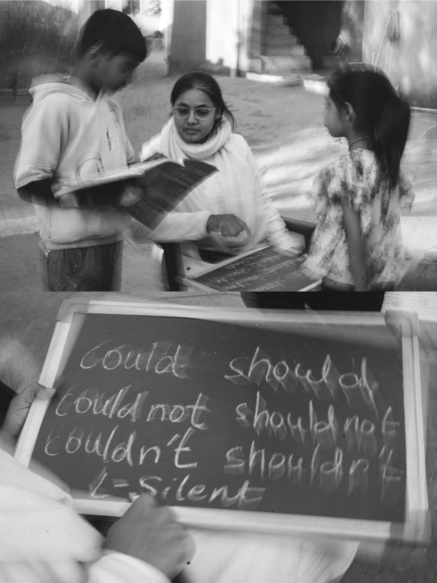 Smriti reading with two children, and a chalk slate with an English lesson